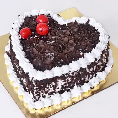 black forest heart shape cake with cherries