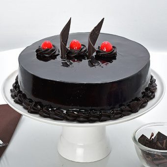 chocolate cream cake with cherries