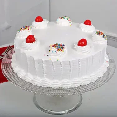 vanill cake design with cherry
