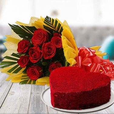 Heart Shaped Red Velvet cake with a bouquet