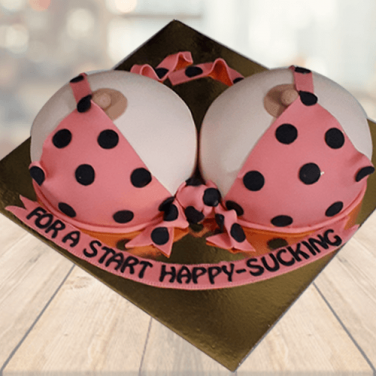 white boobs with pink doted bra boobs cake