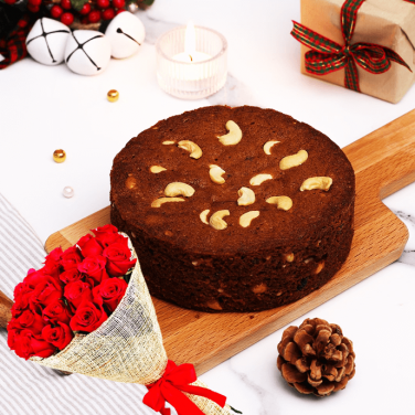 christmas plum cake combo with red roses bouquet