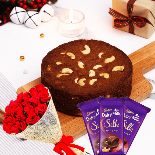 rich plum cake combo with roses bouquet and chocolates