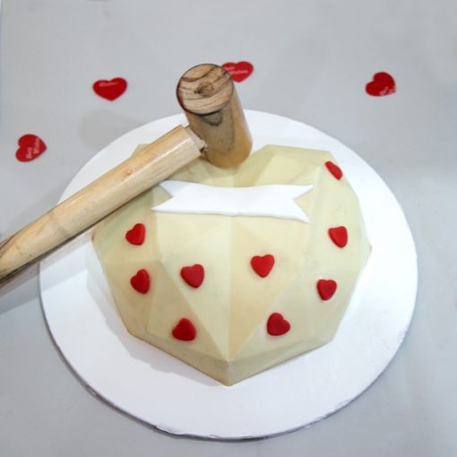 pinata cake with hammer heart shape