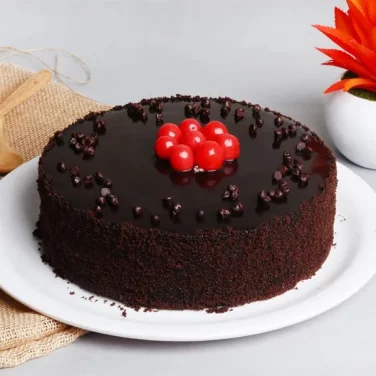 dark chocolate truffle cake with cherries