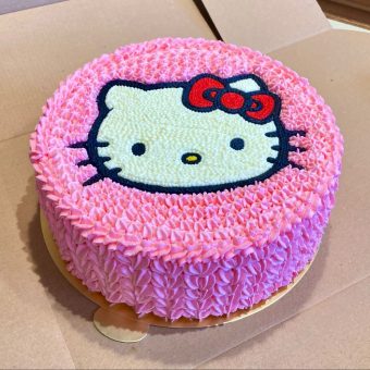 kitty first birthday cake