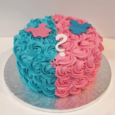 blue and pink baby shower cake