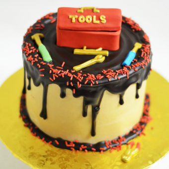 tools theme drip cake