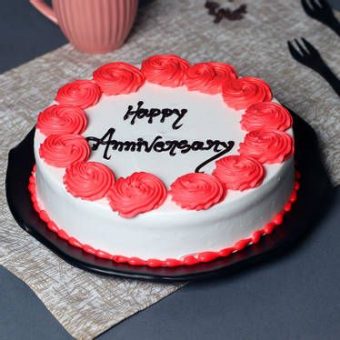 white anniversary cake