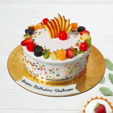 Fruit-topped birthday cake