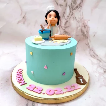 woman chef birthday cake