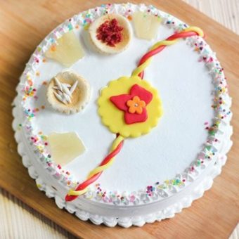 delightful happy rakhi cake