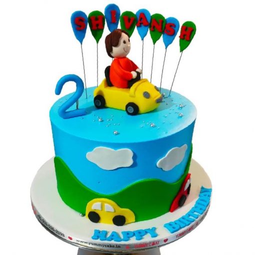 2nd birthday cake with a car and balloons theme