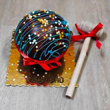 Breaking Cake With Hammer