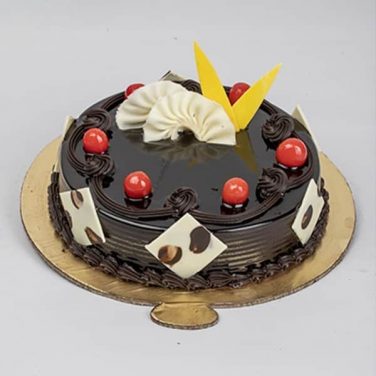 extravagant chocolate truffle cake with cherries