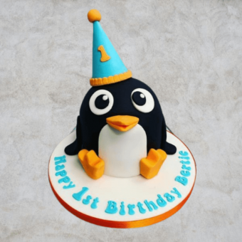 penguin theme pinata cake