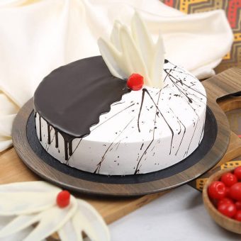 delectable choco vanilla cake cherry on the top