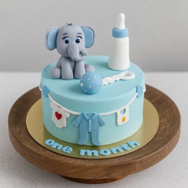 baby elephant theme cake with milk bottle