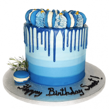 birthday blue drip cake with macaron
