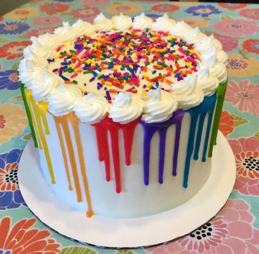 rainbow drip cake with sprinkles