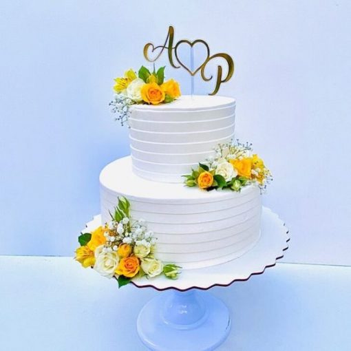 2 tier wedding cake with real flowers