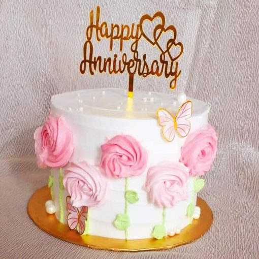 pink and white anniversary cake
