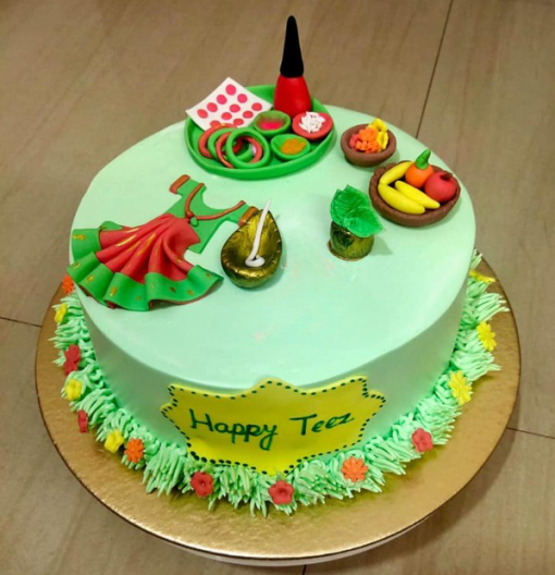 teej theme cake design