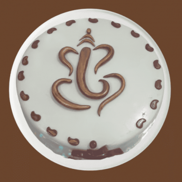 a cake with ganesh design on the top