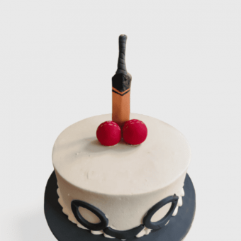 bat and ball cake with handcuff design