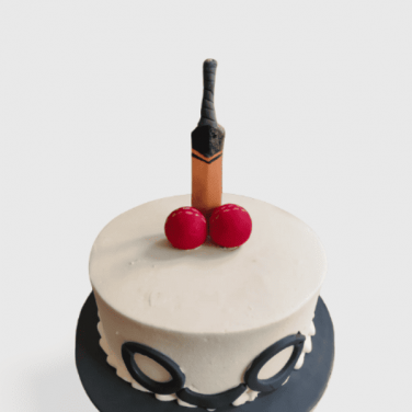 bat and ball cake with handcuff design