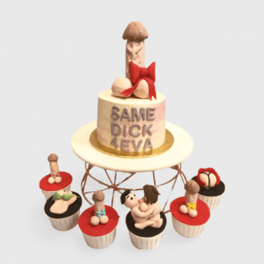 A dick design cake with 6 cupcakes