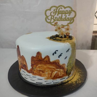 landscape painting cake with birthday topper