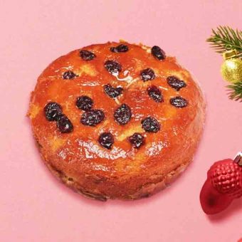 Golden plum cake with raisins