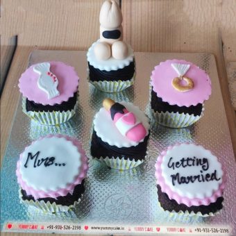 a set of 6 cupcakes with getting married message