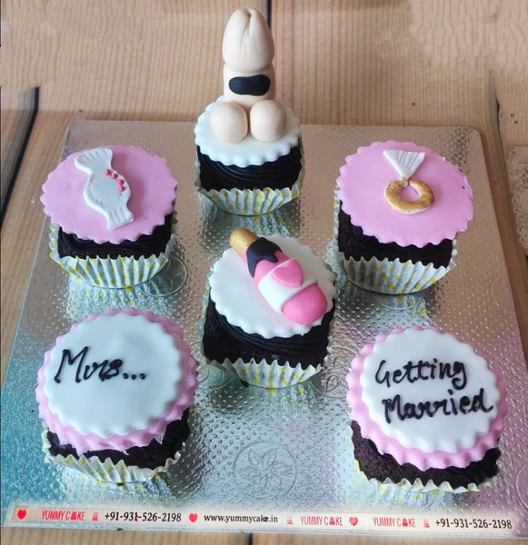 a set of 6 cupcakes with getting married message