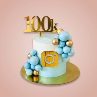 100K Instagram followers blue celebration cake