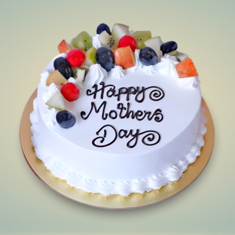 Mother’s Day fruit cake with white frosting and “Happy Mother’s Day” message