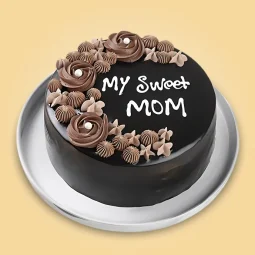 Chocolate Mother’s Day cake with “My Sweet Mom” message and decorative cream flowers