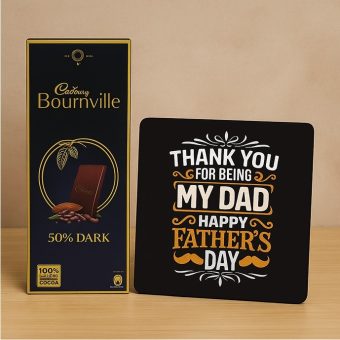 Father’s Day gift combo featuring a Bournville dark chocolate bar and a “Thank You Dad” message plaque on a wooden table.