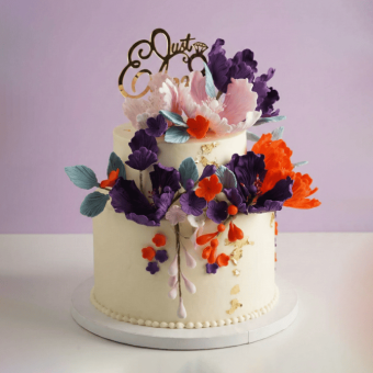 2 tier colorful floral engagement cake