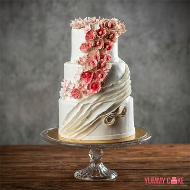 Three Tier White Wedding Cake with Flowers