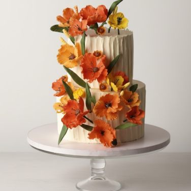 orange floral two tier wedding cake