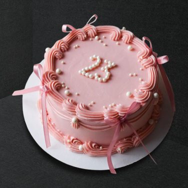 pearl pink ribbon cake