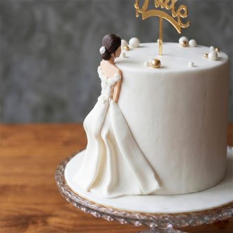 bridal shower cake with bride figurine side view