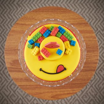 lego smile face birthday cake top view