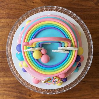 tiered sky & rainbow unicorn cake top view